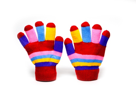 red mittens with color stripes over white 