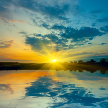 Nice sunset over lakeの写真素材