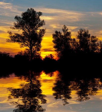 Nice sunset scene on lakeの写真素材