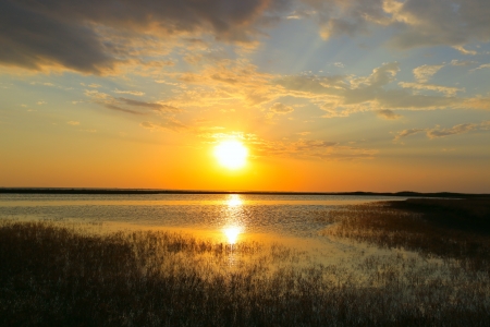 Nice sunset over lakeの写真素材