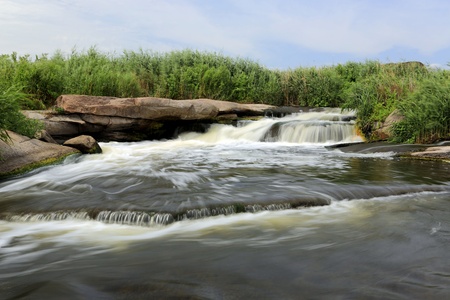 Quick water stream on river の写真素材