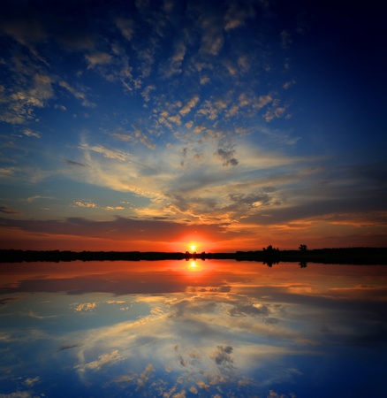 Nice sunset over lakeの写真素材