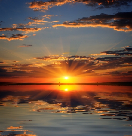 sunshine on evening over water surfaceの写真素材