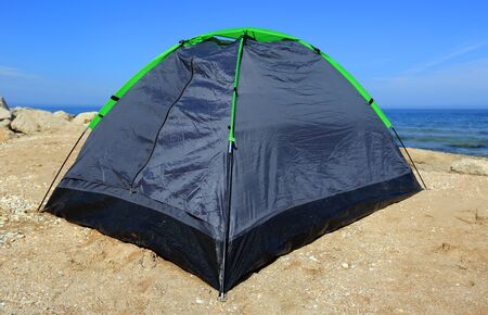 Tourist tent on sea in summer morningの写真素材