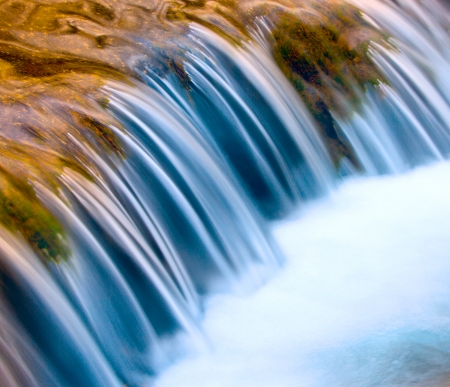 cascade of waterfall in mountain riverの写真素材