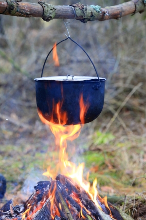 Tourist kettle on camp fireの写真素材