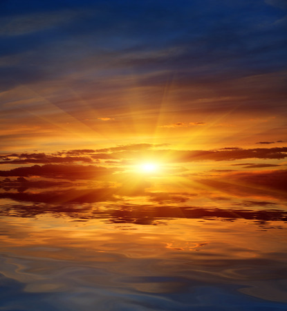 Scene with sunset over lakeの写真素材