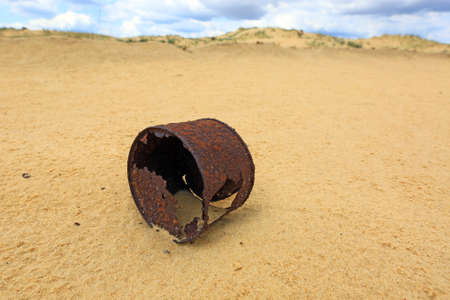 broken rusty can on sundの写真素材