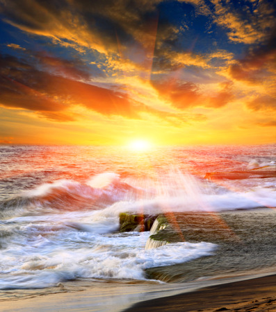 sunset scene over ocean surfaceの写真素材