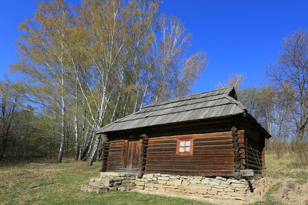 Traditional ukrainian wooden house in open-air museum Pirogovo. Kiev, Ukraine

の写真素材