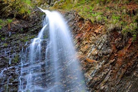 Nice waterfall in carpathians forestの写真素材