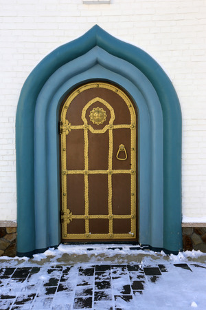 Old style vintage door at winter timeの写真素材