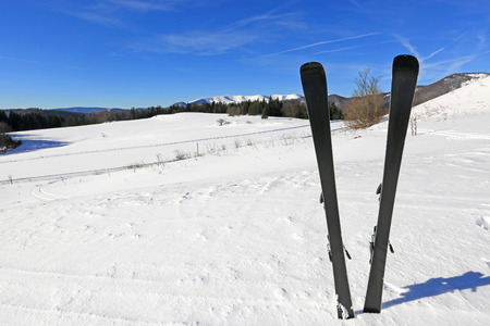 Mountain's ski on mountain background at nice sunny dayの写真素材