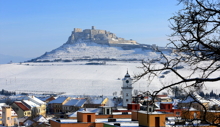 town's roof on old castle background in Slovakiaの写真素材