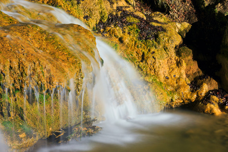 small mountain stream among stonesの写真素材