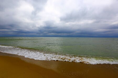 Landscape with thunderstorm over seaの写真素材