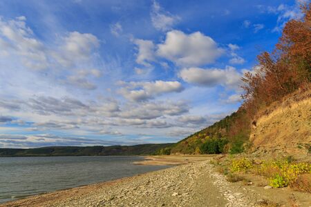 scene on lake shore in nice autumn dayの写真素材