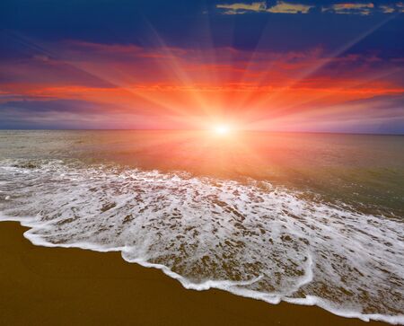 Nice sunset over sea shoreの写真素材