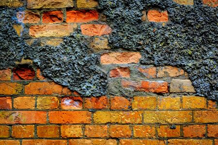 old red brickwork of abandoned building - abstract backgroundの写真素材