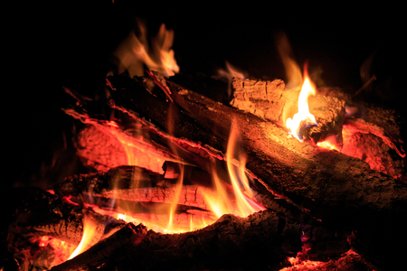 flame of hot campfire in darknessの写真素材