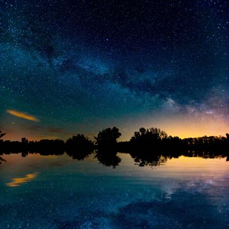 nice night sky over lake in summerの写真素材