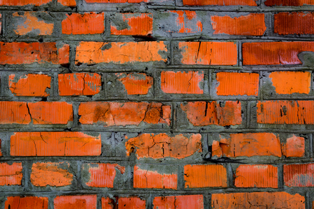old wall with red brickwork - abstract backgroundの写真素材