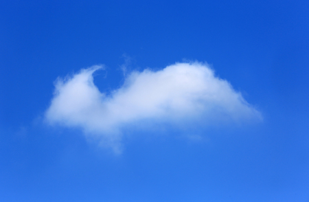 alone cloud in spring blue skyの写真素材