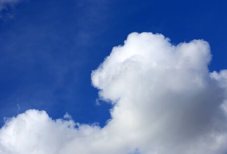 Nice white clouds on blue sky backgroundの写真素材