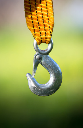steel hook on yellow strapの写真素材