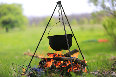 Smoked tourist kettle over campfireの写真素材