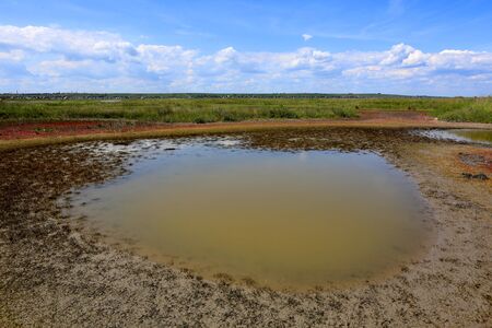 salt pond in steppe in sunny summer dayの写真素材