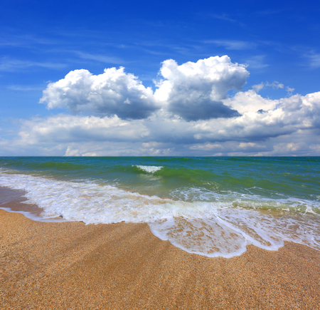 Summer scene on sea with clouds in skyの写真素材