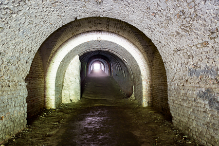 entrance to old abandoned underground tunnelの写真素材