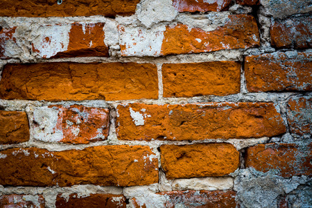 old cracked red brickwork backgroundの写真素材