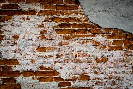 old wall with red brickwork - abstract backgroundの写真素材