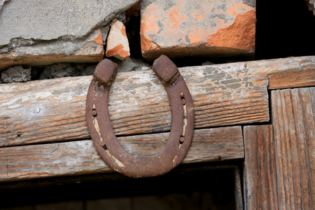 abstract old horseshoe over doorの写真素材