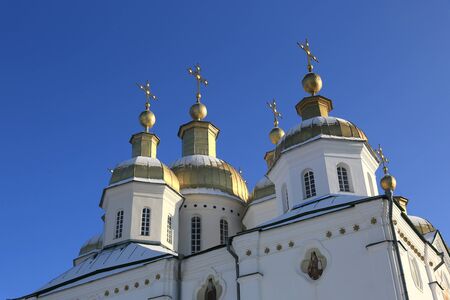 Cupola of Trinity Church Exaltation of the Cross Monastery on blue sky background. Ukraine, Poltavaの写真素材