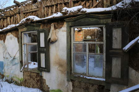 old windows in abandoned rural houseの写真素材
