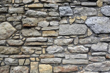 Stonework wall of old building - abstract backgroundの写真素材