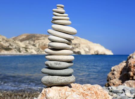 abstract balanced stones on sea shoreの写真素材