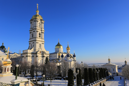 bell tower of the Holy Dormition Pochayiv Lavra in the morning sunlight, Ukraineの写真素材