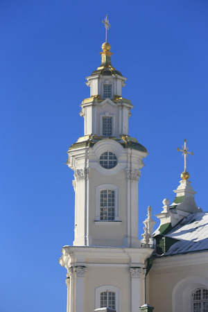 Bell tower of Holy Dormition Pochayiv Lavra in the morning sunlight, Ukraineの写真素材