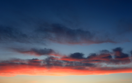 evening sky with red clouds after sunsetの写真素材
