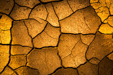 Abstract background with cracked earth