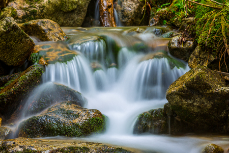 Small watrfall on mountain streamの写真素材