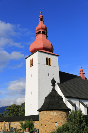 Church of Sv. Ladislav in Liptovske Matiasovce in Slovakia in sunny dayの写真素材