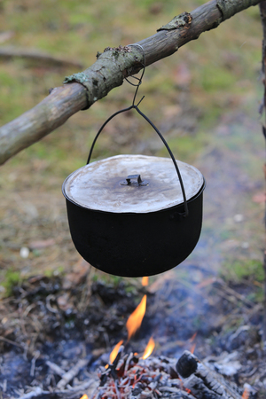 tourist smoked kettle over camfireの写真素材