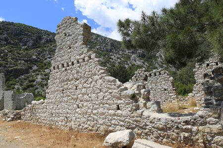ruine of old wall in ancient city Olympos in Turkeyの写真素材