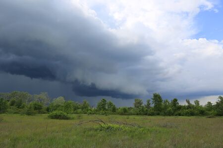 sky with heavy clouds in steppe before thunderstorm