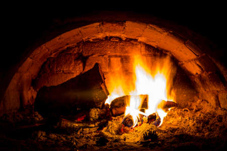 Hot flames of burning wood in oven